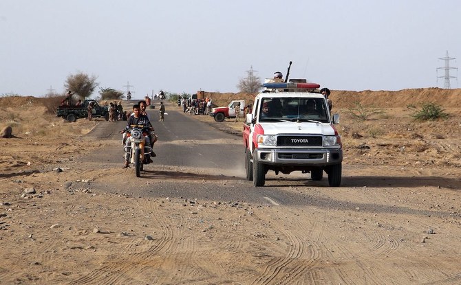 イエメン西部のフダイダで前線に展開し、市民や物流を守る政府側勢力。（資料写真/AFP）