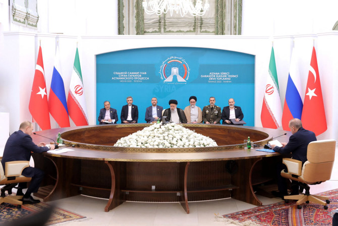 2022年7月19日、ロシアのウラジーミル・プーチン大統領、イランのイブラヒム・ライシ大統領、トルコのタイップ・エルドアン大統領がテヘランで会合している。（WANAの資料 ロイター経由）