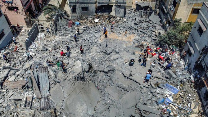 パレスチナ側が視察のため空撮した、イスラエルの空爆により破壊され倒壊したガザ市の建物の跡 2022年8月6日撮影 (AFP提供)