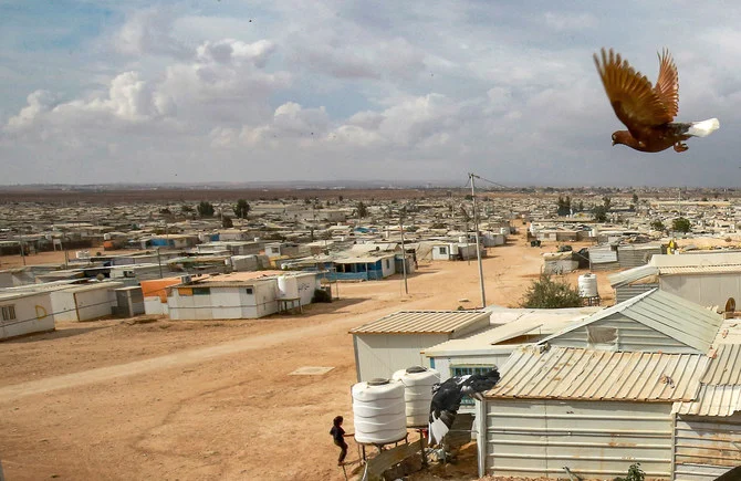 ヨルダンのシリア難民キャンプ・ザータリで、第11回と第12回のボランティアプログラムを完了したKSRelief。(ファイル/AFP)