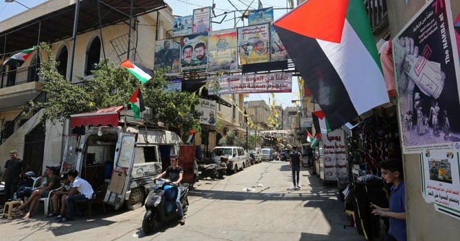 2019年6月24日、レバノン・ベイルートのブルジュ・アル・バラジュネ難民キャンプに掲げられたパレスチナの旗。（ロイター）