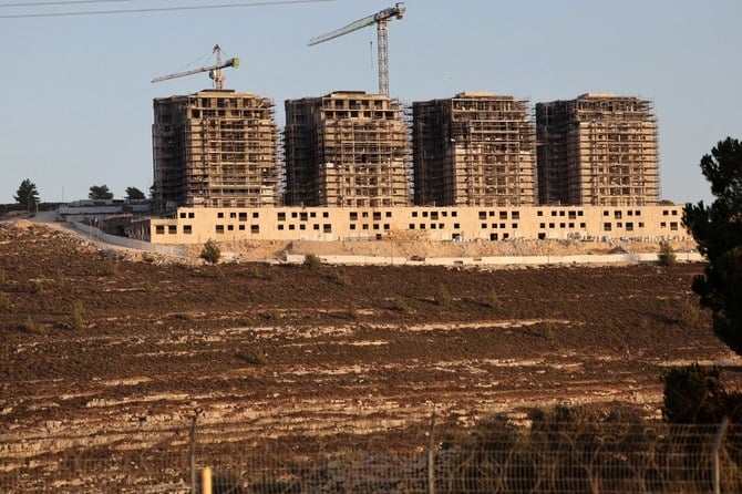 ユダヤ人入植地の建設現場。イスラエル占領下のヨルダン川西岸地区、エルサレムとラマッラーの間にあるギバット・ゼーブ。（ファイル/AFP）