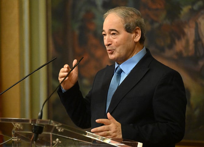 2022年8月23日、シリアのファイサル・ミクダード外相がモスクワで会談を行った後、ロシア外相と共同記者会見に臨んでいる。（AFP）