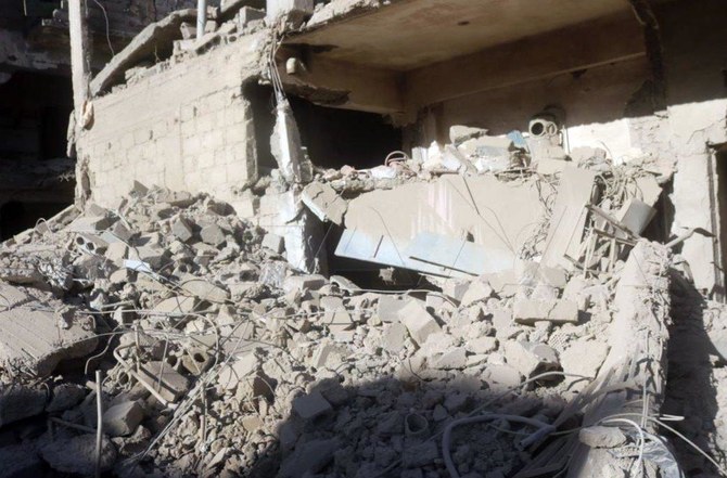 国営シリア・アラブ通信（SANA）が公開したこの画像に写っているのは、2023年3月8日にシリアのデリゾールで起きた爆発で破壊された建物のがれき。（AP）