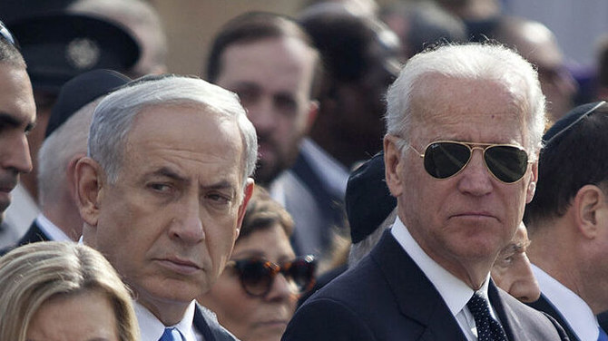 アリエル・シャロン元首相の追悼式典に出席するベンヤミン・ネタニヤフ首相とジョー・バイデン副大統領（当時）。2014年1月、エルサレム。（Getty Images）