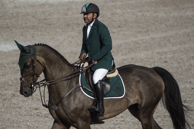 以前のアジア競技大会のトーナメントで競技するサウジアラビアのオリンピック馬術選手、ラムジー・アル・ドハミ。(AFP/資料写真)