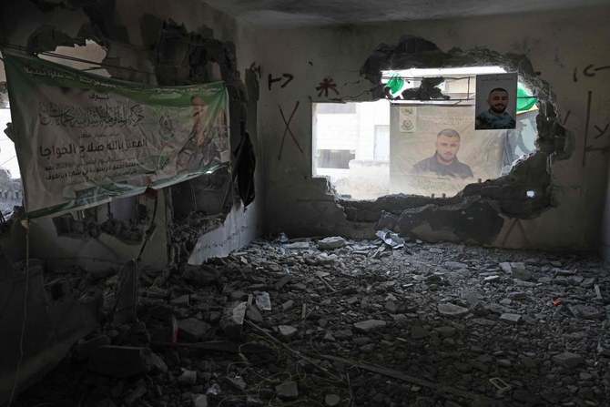 この写真に写っているのは、テルアビブで死者を出した銃による襲撃を行ったパレスチナの過激派モアタズ・ハワジャの、イスラエル治安部隊によって完全に破壊された、ヨルダン川西岸地区にある家だ。（AFP）