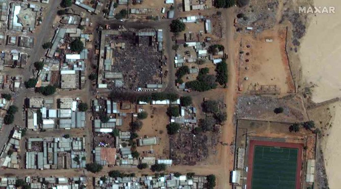 上は、2023年5月17日に撮影された衛星写真。スーダンの西ダルフール州都ジュナイナの市場の破壊の跡。（Maxar Technologies/AFP）