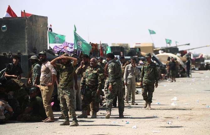 テロ組織ダーイシュと戦うために2014年に結成された民兵組織ハシュドは、イラク軍とほぼ同じ規模にまで拡大した。(AFP)