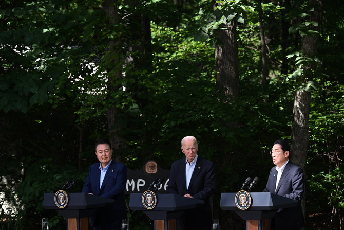 記者会見で発言するジョー・バイデン米大統領、岸田文雄首相、尹錫悦韓国大統領。（AFP）