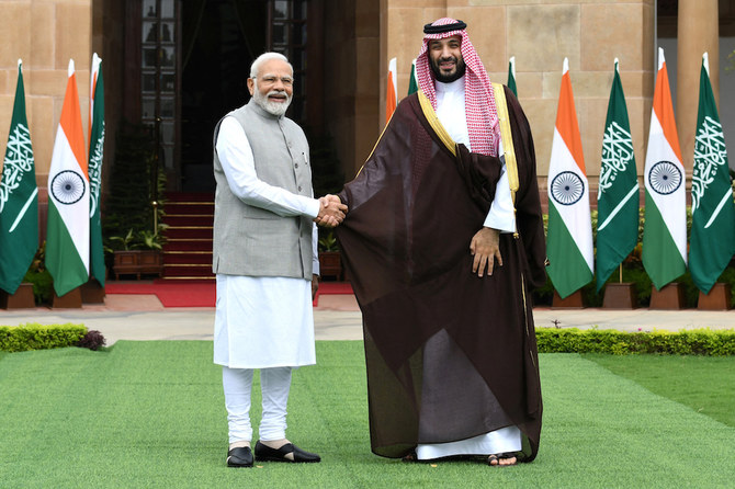 今週のG20サミットでインドのナレンドラ・モディ首相と会見するムハンマド・ビン・サルマン皇太子。(ロイター）