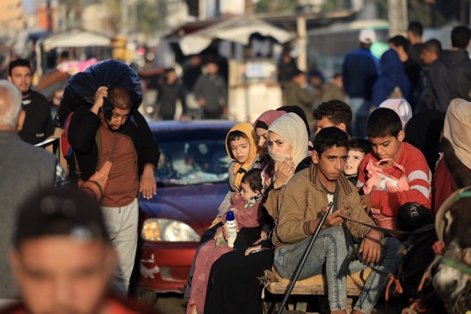 6週間にわたる容赦のない空爆の後の4日間の一時停戦により、ガザ地区のパレスチナ難民は援助物資を受け取ることができるようになる。（AFP）