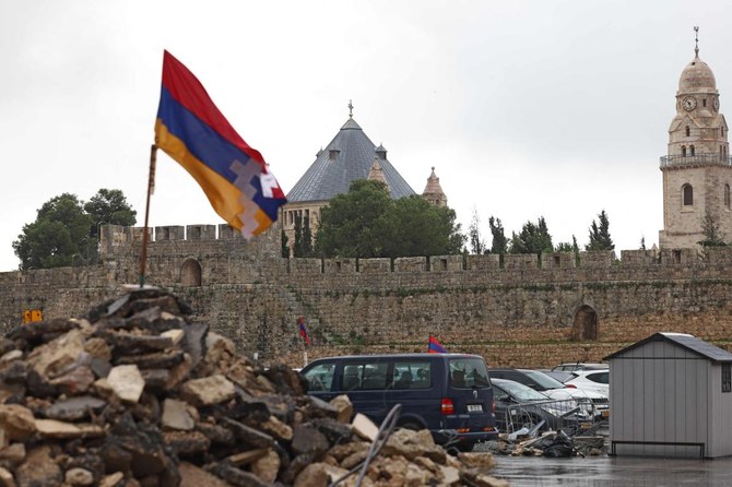 エルサレム旧市街のアルメニア人駐車場。歴史的なアルメニア地区4分の1を占める高級ホテルを建設するため、イスラエル入植地である同地区にブルドーザーが乗り入れたとき、住民たちは迅速に反応した。（AFP）