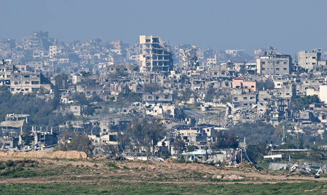 2024年2月3日。イスラエルとハマスの紛争が続くガザで、廃墟と化した建物が立ち並ぶ。（ロイター）