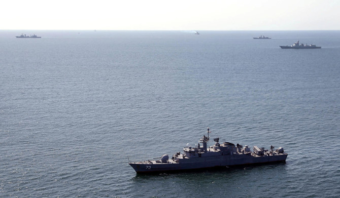 2024年3月12日、オマーン湾で行われたロシア、中国、イランによる国際海軍演習「Maritime Security Belt 2024」に参加する軍艦。(REUTERS)