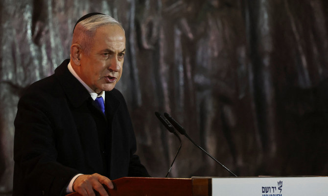 2024年5月5日、エルサレムの世界ホロコースト記念センター、ヤド・ヴァシェムで行われたイスラエルのホロコースト記念日の開会式でスピーチするベンヤミン・ネタニヤフ首相。(ロイター）