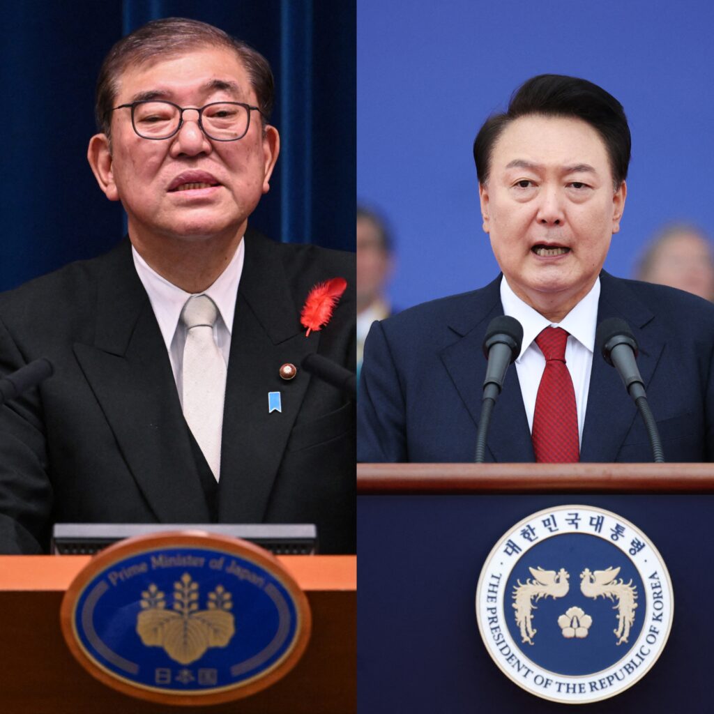 両首脳は北朝鮮の核・ミサイル開発に米国を含めた３カ国で連携して対処する方針を確認。(AFP)
