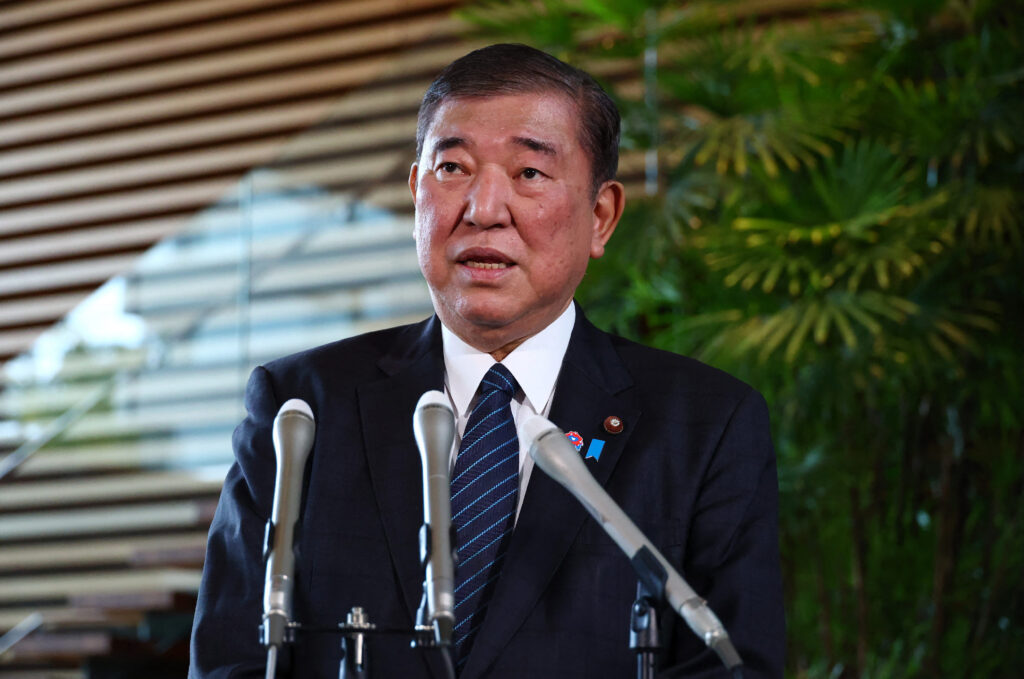 「アメリカ大統領に屈服するような日本の首相は、何の役にも立たない」と、現在東京に拠点を置く日系アメリカ人の町田氏は語った。(AFP)