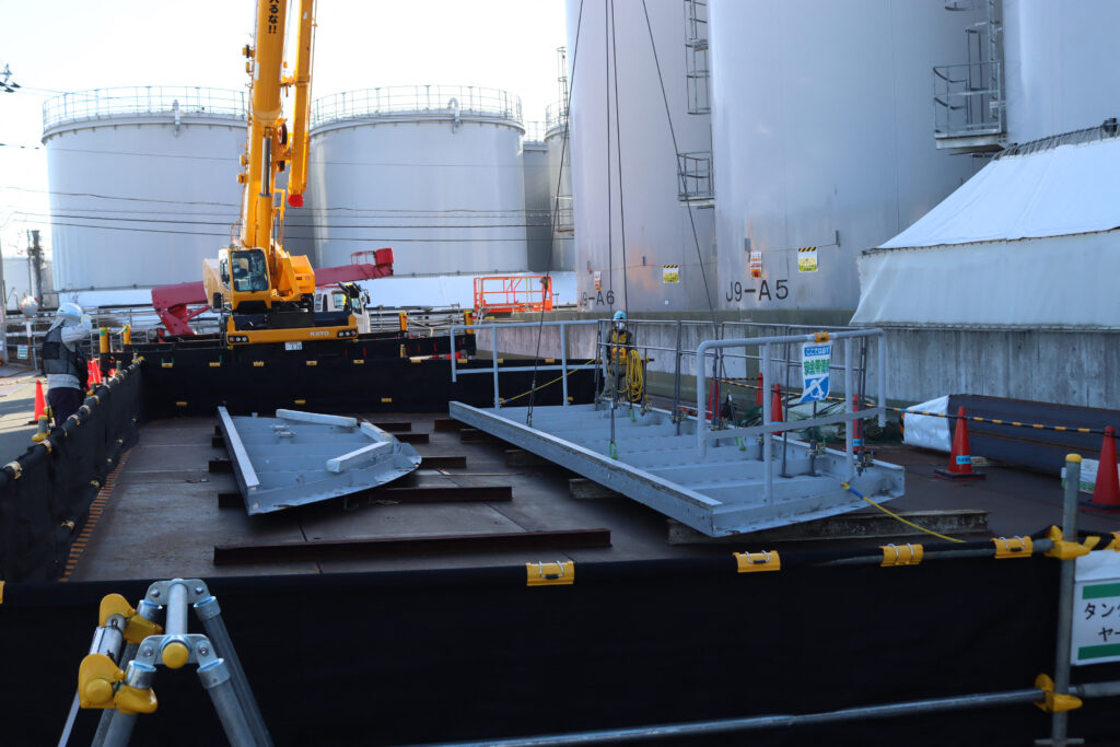 東京電力は、福島第一原発の損傷した原子炉内に残る約880トンの放射性物質の適切な保管場所を見つける責任を負っている。(AFP)